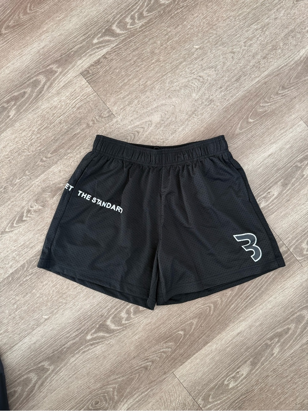 Black Athletic Mesh Shorts with White Logo